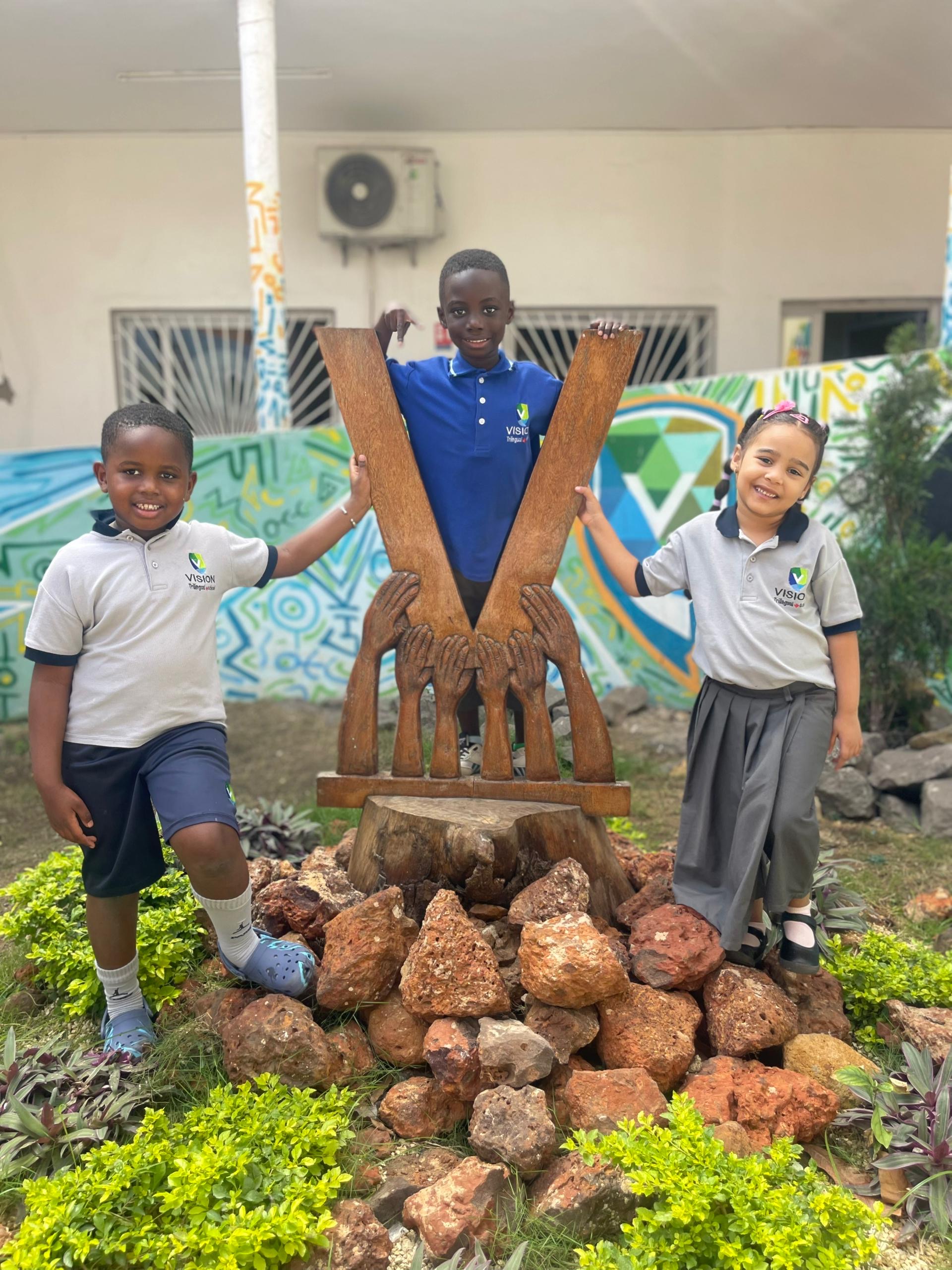 Vision School students outside